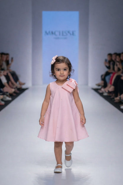 Pink pearl bow A-line party dress for girls — oversized shoulder bow with pearl embellishments — Nibblekins