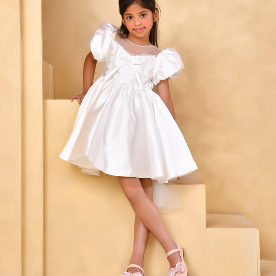a young girl white mini dress from nibblekins 