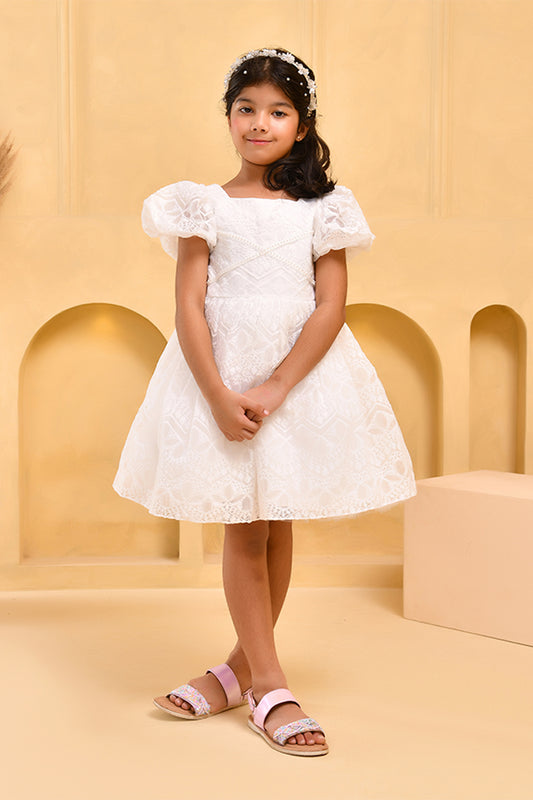 a young girl wearing white lace dress with boho theme background