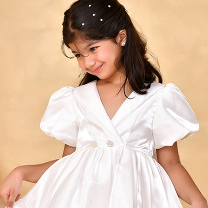 White satin princess party dress for girls — V-neck collar with crystal buttons, puff sleeves and full flared skirt — Nibblekins